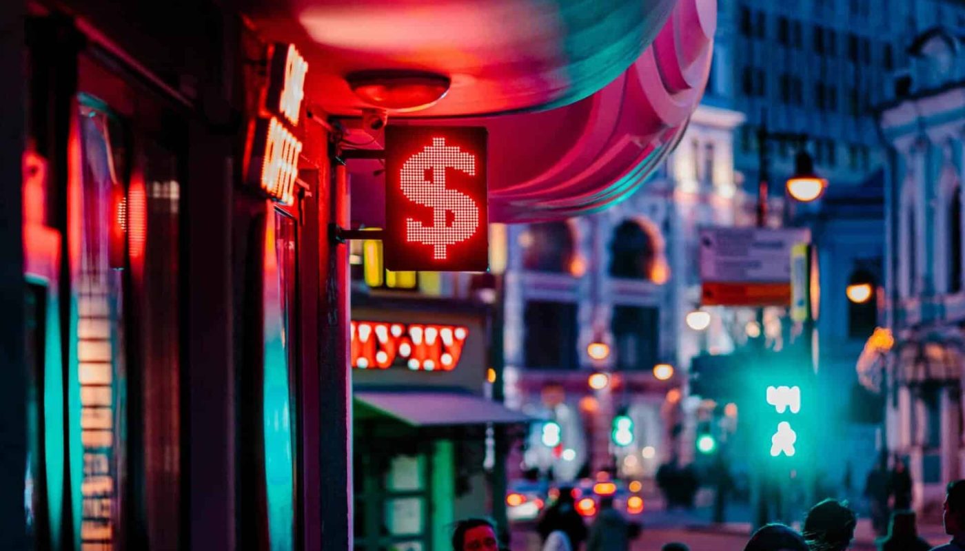 people walking on street during night time